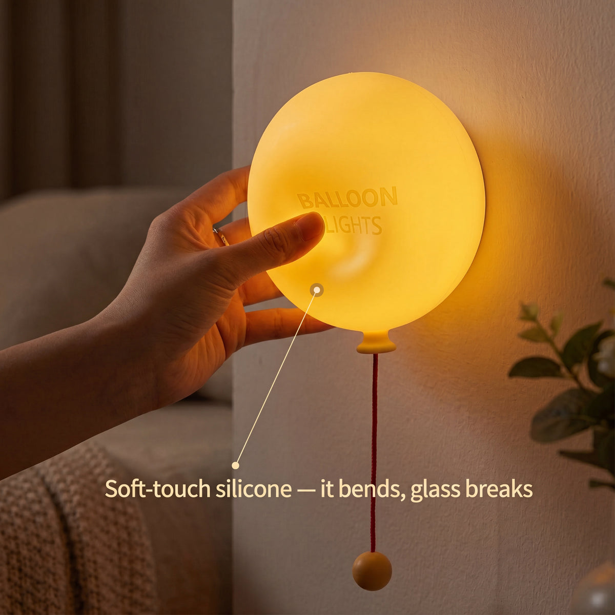 Authentic customer photo of the balloon lamp mounted in a cozy study corner, casting a relaxing warm glow over books and plants