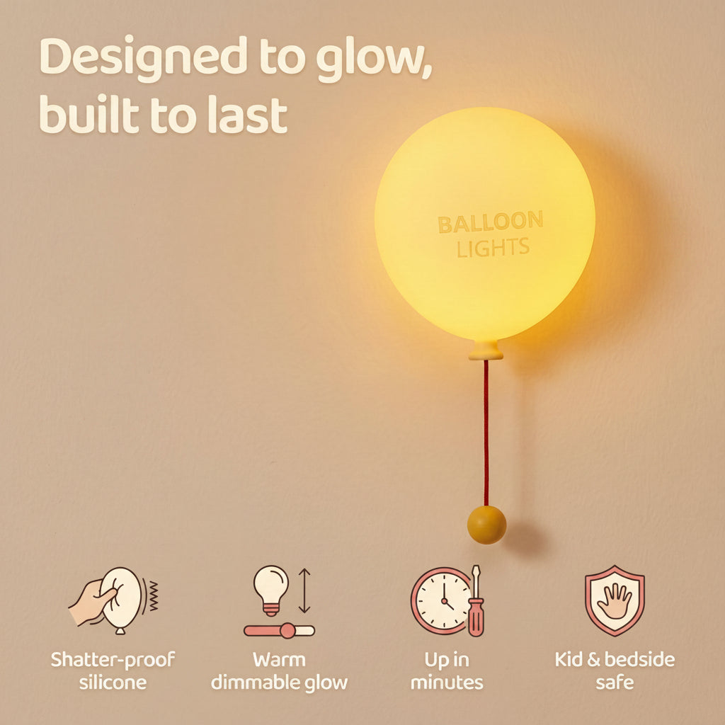 Close-up of the balloon wall lamp highlighting features: soft BPA-free silicone shell, warm glowing internal LED, and tactile pull-string switch